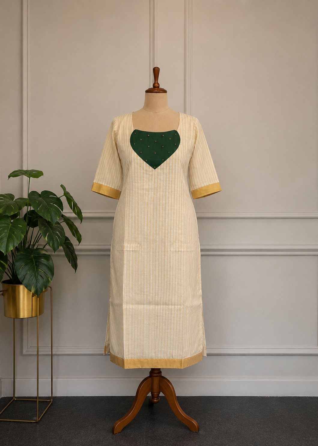 Thilaka - emerald Grace golden stripes with green patch Kurti